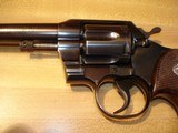 Colt Official Police
.38 Spec. 6"HB MFG 1955 Excellent
all Original
With Full Checkered Walnut Target Stocks Silver Medallions - 10 of 14
