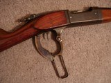 Savage Mod. 1899-B Utica N.Y. Take Down rifle .300 Savage Lever Act.
24"BBl. Lyman Tang Sight Very Nice original condition - 13 of 19