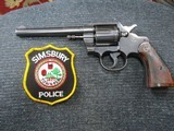 Colt Official Police .22 Caliber 6"BBL.Fixed Sight, Colt Wood Stocks, Blue Two Tone, Excellent Original Condition MFG 1948