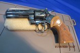 COLT PYTHON BLUE 4 INCH 357 WITH WHITE OUTLINE REAR SIGHTS