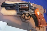 SMITH & WESSON" REGISTERED MAGNUM "357 4- INCH BLUE