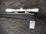 REMINGTON 700 TITANIUM WITH MCGOWEN 7MM-08 AND LEUPOLD VARIX IIC 3-9X40 - 12 of 20