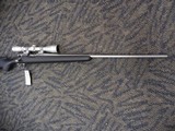REMINGTON 700 TITANIUM WITH MCGOWEN 7MM-08 AND LEUPOLD VARIX IIC 3-9X40 - 8 of 20