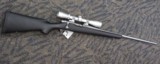 REMINGTON 700 TITANIUM WITH MCGOWEN 7MM-08 AND LEUPOLD VARIX IIC 3-9X40 - 1 of 20