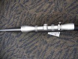 REMINGTON 700 TITANIUM WITH MCGOWEN 7MM-08 AND LEUPOLD VARIX IIC 3-9X40 - 4 of 20