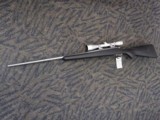 REMINGTON 700 TITANIUM WITH MCGOWEN 7MM-08 AND LEUPOLD VARIX IIC 3-9X40 - 16 of 20