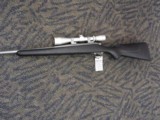 REMINGTON 700 TITANIUM WITH MCGOWEN 7MM-08 AND LEUPOLD VARIX IIC 3-9X40 - 14 of 20