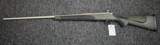 Remington 700 Stainless .338 Win Mag - 1 of 9