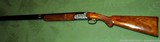 Factory Cased and Deep Relief Engraved Rizzini 28 Gauge Round Body Over Under 28 Inch Like New - 2 of 15