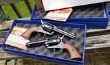 Consecutive Pair Colt 3rd Gen. SAA .45 Cal. Revolvers 4 3/4" Unfired in the Boxes from 1999 Blue & Case & Walnut Like New