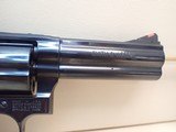 Smith & Wesson Model 586-8 Distinguished Combat Magnum .357 Magnum 4" Barrel Blued Finish L-Frame Revolver - 4 of 19