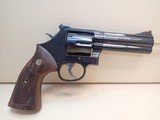 Smith & Wesson Model 586-8 Distinguished Combat Magnum .357 Magnum 4" Barrel Blued Finish L-Frame Revolver - 1 of 19