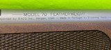 USED Winchester 70 Classic Featherweight 6.5 CM 22 In SS Stainless Walnut - 7 of 15