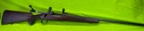 Winchester Model 70 Deluxe 300 Win Magnum 26 In RMEF Blued Walnut CRF - 1 of 16