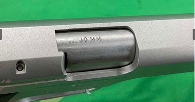 STAINLESS SMITH & WESSON 1006 10MM FULL SIZE S&W - Image 11 of 16