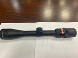 Trijicon 3-9x40MM rifle scope - 1 of 4