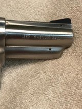 Ruger Police Service Six 357, Stainless stainless construction, 2 3/4 or 4 in. barrel, fixed sights, checkered walnut grips. - 5 of 7