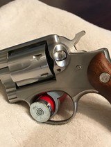 Ruger Police Service Six 357, Stainless stainless construction, 2 3/4 or 4 in. barrel, fixed sights, checkered walnut grips. - 4 of 7