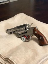 Ruger Police Service Six 357, Stainless stainless construction, 2 3/4 or 4 in. barrel, fixed sights, checkered walnut grips. - 2 of 7