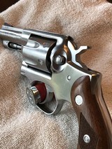 Ruger Police Service Six 357, Stainless stainless construction, 2 3/4 or 4 in. barrel, fixed sights, checkered walnut grips. - 6 of 7