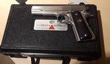 Colt
"First Edition"
Delta Elite S/S 10mm - 2 of 3