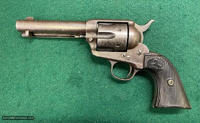 Colt 1st gen SAA in .32 20 w/a 4 3/4
bbl.
