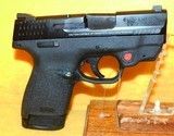 S&W M&P9 SHIELD WITH GREEN LASER - 1 of 3