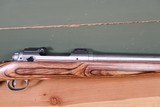 Savage Model 12 204 Ruger Left Hand Fluted Stainless Heavy Bull Barrel Laminated Stock LH 26