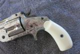 SMITH & WESSON MODEL 1 1/2 NICKEL ENGRAVED
- 2 of 9