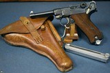 WIEMAR POLICE DWM ALPHABET LUGER……1928 “r” BLOCK…..FULL RIG WITH 2 MATCHING HAENEL POLICE MAGS…..MINT! - 1 of 25