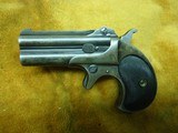 Remington Derringer
Double Barrel 41 rim fire w/box of ammo - 1 of 9