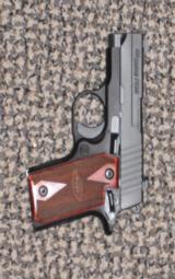 SIG SAUER P-238 BLACK W/ ROSEWOOD GRIPS - 1 of 4