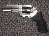 RUGER GP-100 FOUR-INCH STAINLESS REVOLVER.... - 1 of 3