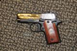 SIG SAUER P-238 ENGRAVED WITH ROSEWOOD GRIPS... - 1 of 4