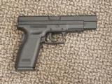 SPRINGFIELD ARMORY XD-45 TACTICAL 5-INCH .45 ACP PISTOL - 1 of 2