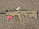 IWI TAVOR TACTICAL BULL-PUP RIFLE IN FDE (FLAT DARK EARTH) IN 5.56 WITH OPTIONAL EOTECH SIGHT - 1 of 4