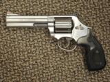 S&W MODEL 686 REVOLVER WITH 5-INCH 7-SHOT .357 MAGNUM
- 1 of 5
