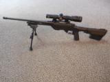 AAC REMINGTON MICRO SEVEN, MODEL 7 TACTICAL RIFLE .300 BLACKOUT IN MDT LSS TACTICAL CHASSIS/STOCK - 1 of 8