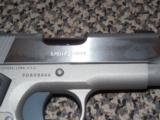 COLT STAINLESS
LIGHTWEIGHT DEFENDER IN 9 MM - 4 of 5