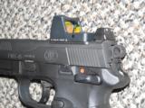 Fn NX-45 TACTICAL .45 ACP PISTOL WITH THREADEDBARREL AND TRIJICON RM SIGHT - 2 of 6
