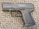 H&K MODEL P-2000 SK 9 MM PISTOL IN .40 S&W WITH NIGHT SIGHTS AND THREE MAGAZINES - 1 of 6