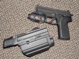 SIG SAUER P-229 TACPAC 9 MM WITH 3 MAGAZINES, LASER/LIGHT, AND HOLSTER - 1 of 5