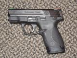 S&W M&P PERFORMANCE CENTER 9 MM SHIELD PORTED - 1 of 4