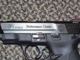 S&W M&P PERFORMANCE CENTER 9 MM SHIELD PORTED - 2 of 4