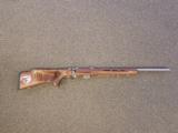 SAVAGE MODEL 93 BTVS STAINLESS HEAVY-BARREL .22 MAGNUM RIFLE WITH LAMINATED THUMBHOLE STOCK - 1 of 6