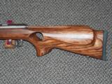 SAVAGE MODEL 93 BTVS STAINLESS HEAVY-BARREL .22 MAGNUM RIFLE WITH LAMINATED THUMBHOLE STOCK - 5 of 6