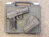 SIG SAUER P-2022 PISTOL IN 9 MM WITH TWO 15-RD. MAGAZINES - 1 of 3
