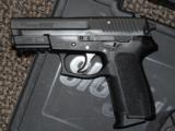 SIG SAUER P-2022 PISTOL IN 9 MM WITH TWO 15-RD. MAGAZINES - 2 of 3
