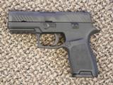 SIG SAUER P-320C PISTOL IN .40 S&W WITH TWO MAGAZINES - 1 of 5