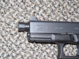GLOCK MODEL 19 WITH FACTORY THREADED BARREL AND HIGH 